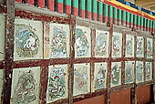 Ladakh - Hemis gompa, painted panels of the lower portico